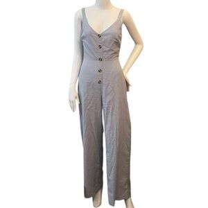 𝐒𝐇𝐎𝐖𝐏𝐎 Gray Sleeveless Jumpsuit with V-Neckline